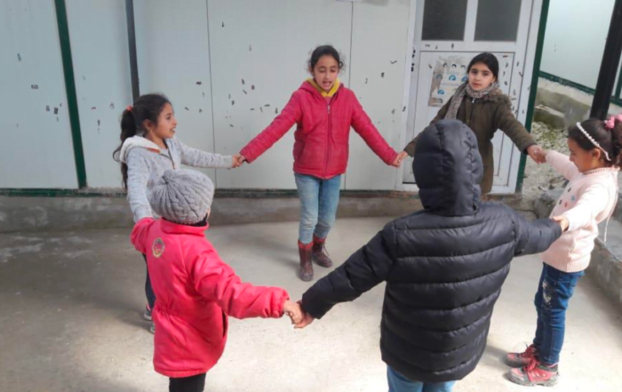 Syrian children in a circle